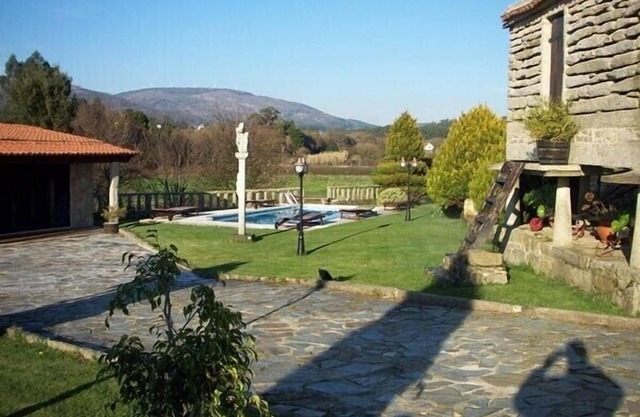 Typical House in a quiet area of ​fields of grass, enclosed