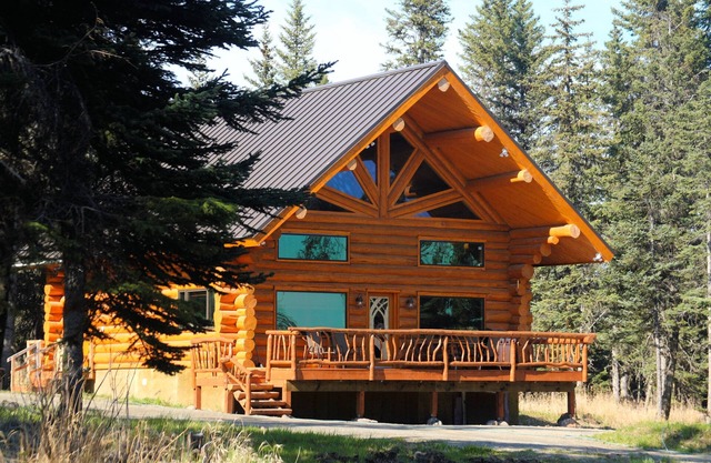Unique Alaskan log home in trees & wild flowers on 14-acre private homestead.