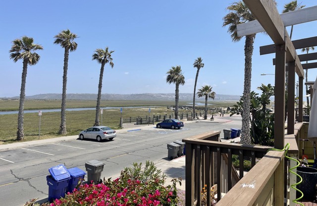 Updated Beach Bungalow 2bd/1 bath steps from beach with private balcony