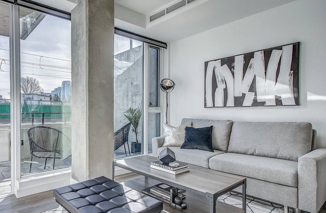 Upscale Industrial Condo with Patio near LRT