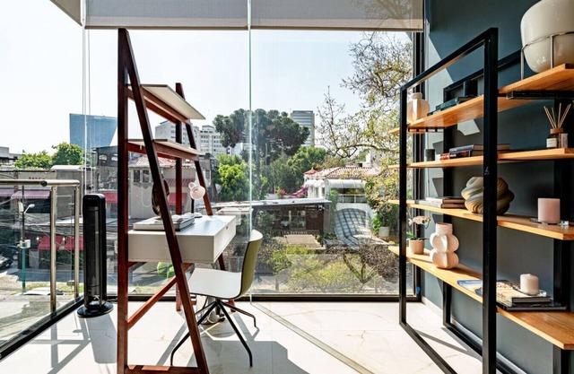 Urban Hideaway with Private Balconies & Coworking