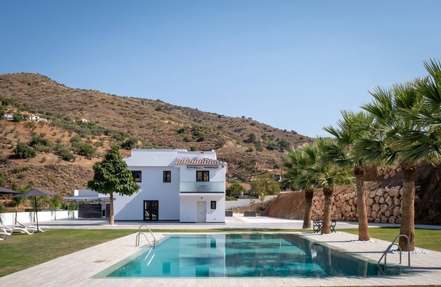 Vacation Home 'Era del Puerto 1' with Mountain View, Pool, 2 Balconies & Wi-Fi