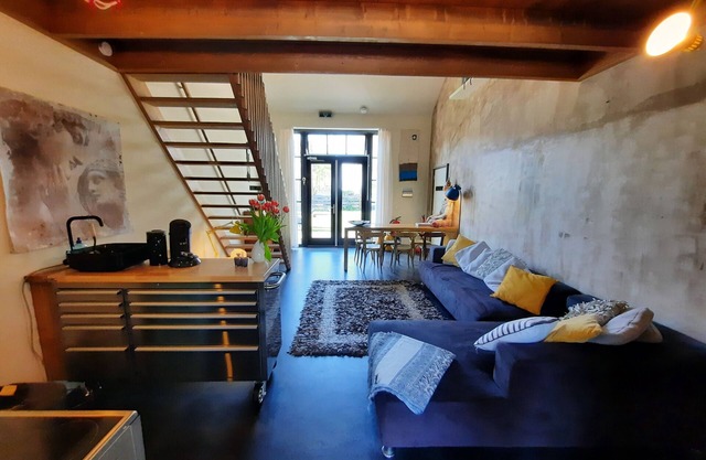 Vacation in a little school? Former classrooms with communal living kitchen!