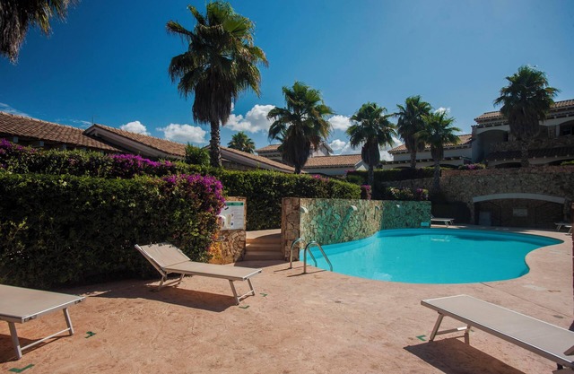 Villa Elegance Sabrina near the beach with pool, air conditioning, garden, and terrace