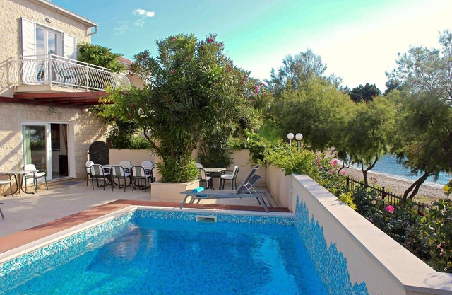 Villa on Brac with pool, walk to town and on the beach, Croatian villa on the beach
