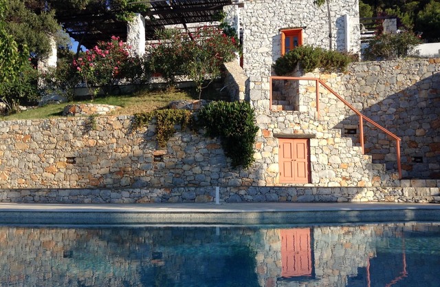 Villa with salt water pool and private beach in a fantastic quiet location