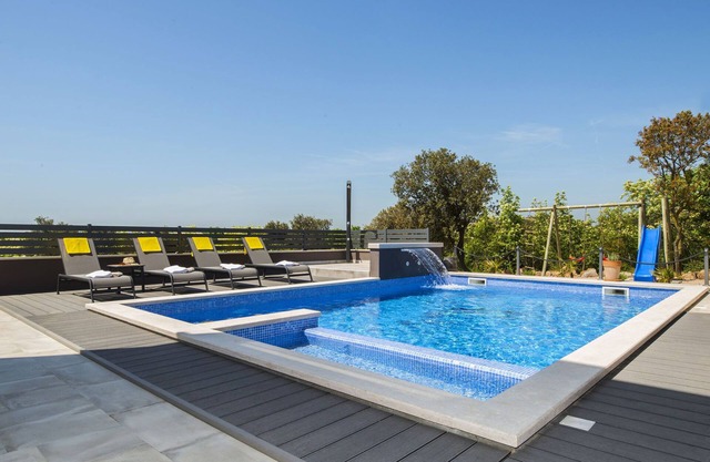 Villa with swimming pool, outdoor kitchen, sauna, jacuzzi, play area and sea view