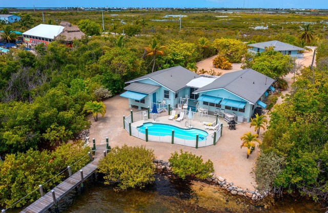Waterfront Beach House with Dock & Heated Pool!