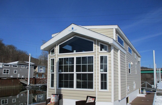 Waterfront Glamping Escape Cozy Floating Cottages on the Peaceful Beaver River