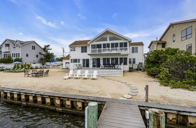 Waterfront Retreat with Dock, Firepit, and Bay Views | 4BR Pelican Island Oasis