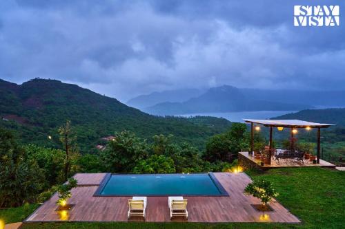 Waterfront Villa with Infinity Pool & BBQ Grill at Pune by StayVista