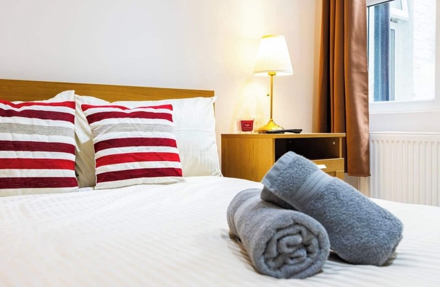 Welcome to Plotseeker’s Stylish 3BR/3BA Retreat West Kensington Gem B
