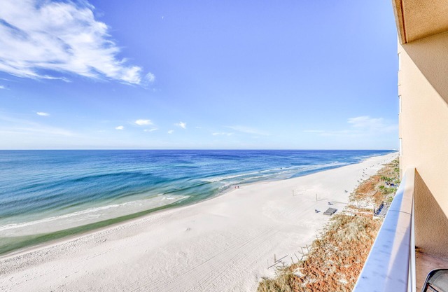 Welcoming, beachfront condo with Gulf views, pools & fitness center