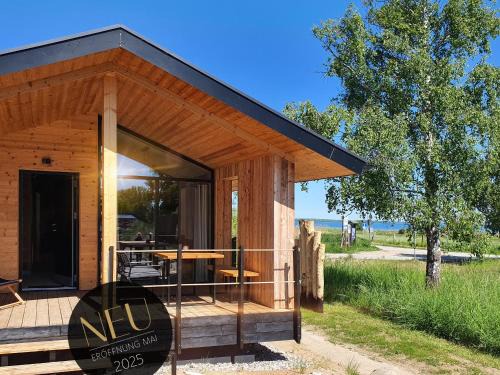 WerderChalet - SEABREEZE - Meerblick I Strand 150m I Sauna I eKamin I 2 Personen und Kind I by "Meyers am Meer"
