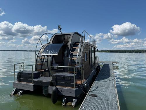 WOHLFÜHLBOOT Hausboot - Festlieger in der Marina Zaue am Schwielochsee - incl Stand Up Board