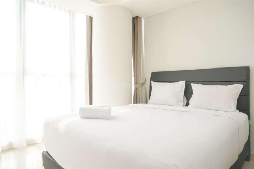 Wonderful and Homey 2BR at Gold Coast Apartment By Travelio