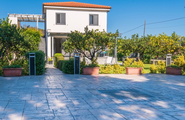 wonderful modern style villa with beautiful orange garden. Sleeps 8