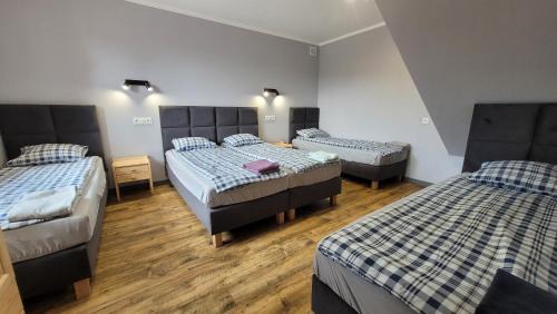Wrzosowe Wzgórze 5 - Apartamenty