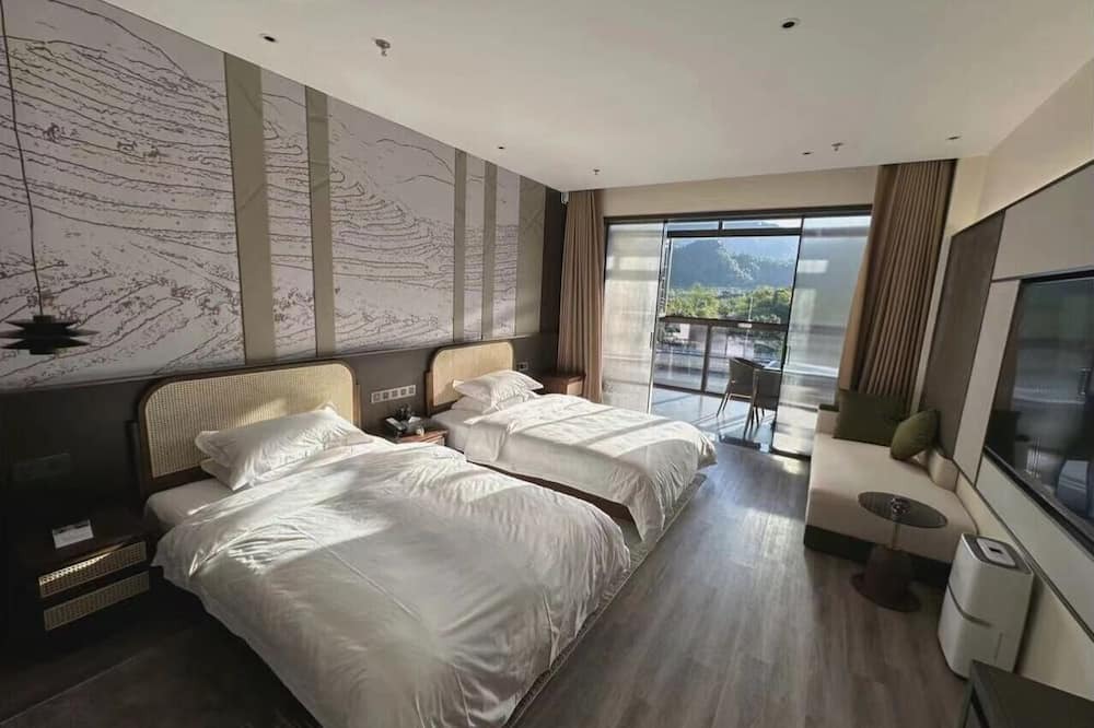 Qiannan Hotel | guangnahupanjiudian