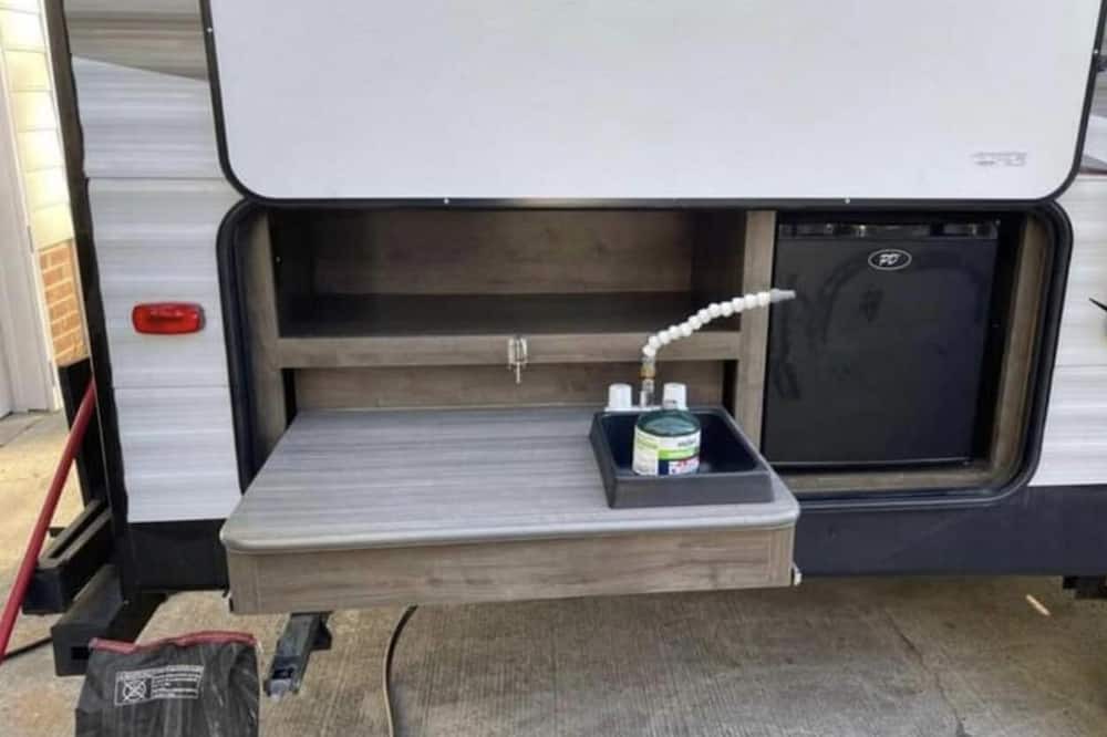 Aurora RV Rental | Camper located in campground! Walking distance to fishing!