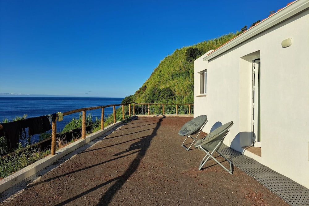 Lajes das Flores House | Holiday Home 'Baía Do Porto Das Lajes' with Sea View, Private Terrace and Wi-Fi