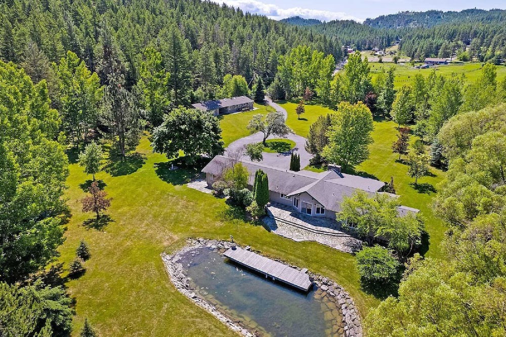 Lakeside House | Private Flathead Lake lagoon and dock, enjoy a spacious 5-bedroom Lakeside home.