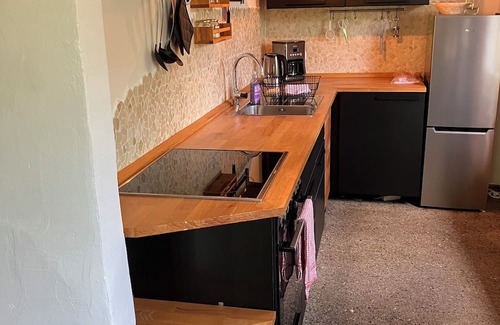 Huy House | Tiny house in a large natural garden