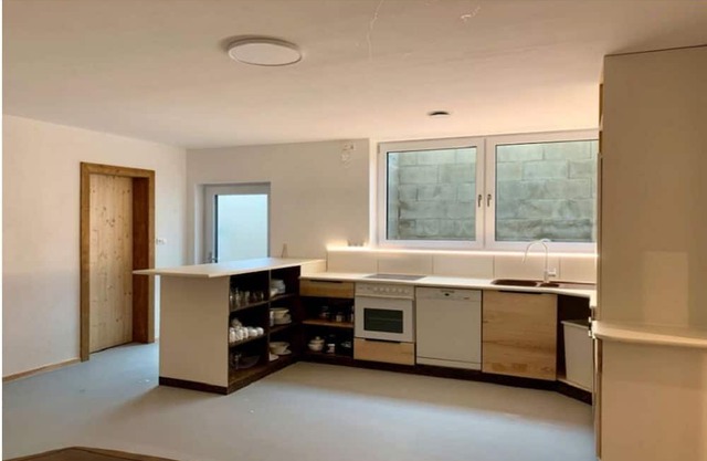 Bright 4-room basement apartment with private access and 3 parking spaces