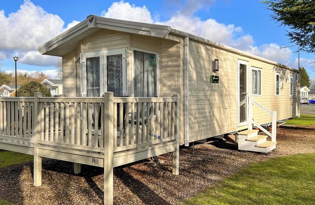 Quality 12ft-wide caravan with one double and one twin.