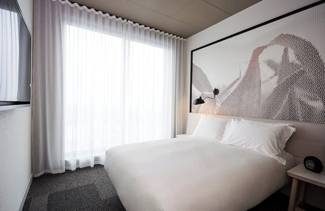 Stay Steps Away from Shopping & Dining in Functionally Designed Room | 3 Units